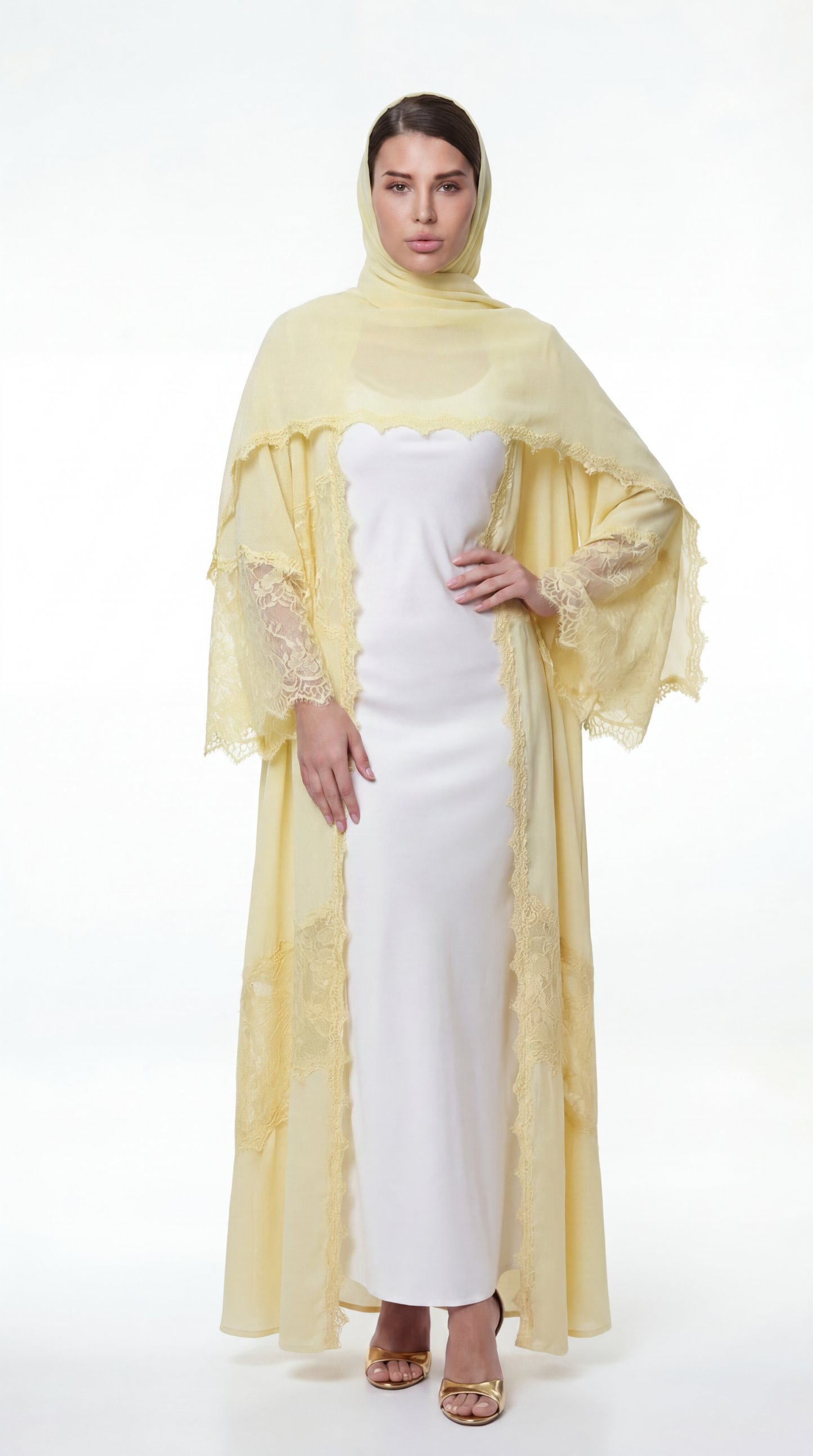 Woman wearing a yellow hijab and white dress on a white background